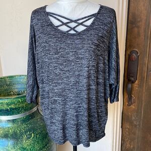 Lite weight sweater updated with crisscross straps at neckline size large